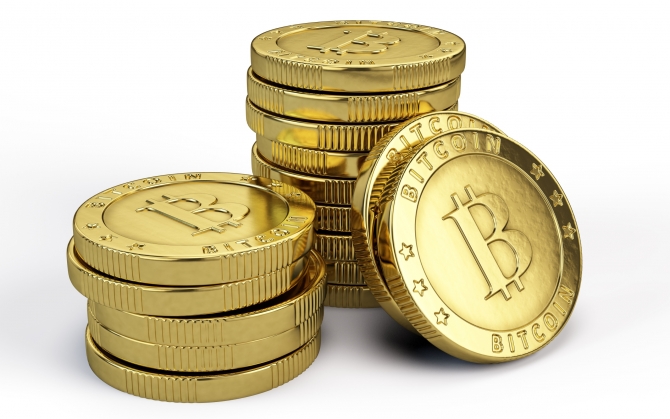 Золотые монеты Bitcoin