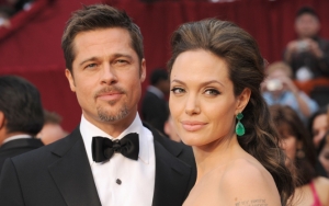 Анджелина Джоли и Брэд Питт на ковровой дорожке