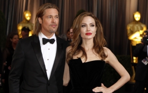 Анджелина Джоли и Брэд Питт на премии Оскар