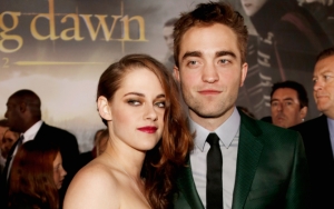 Кристен Стюарт и Роберт Паттинсон на премьере