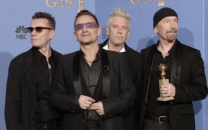 U2 с золотым глобусом
